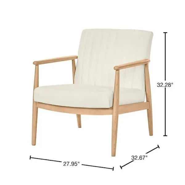 Sillón tapizado en tela color marfil con cojines removibles